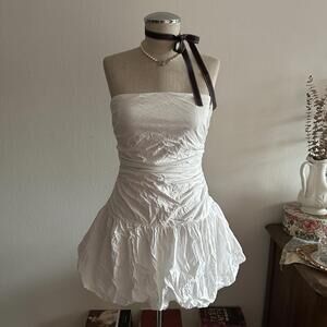 White strapless bubble hem dress